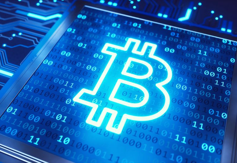 Bitcoin Hologram Symbol over Crypto Trading Graphic