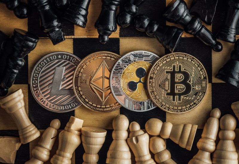 Bitcoins above a chess game table