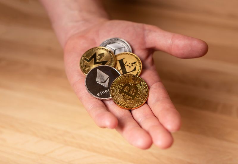 Crypto Coins in hand